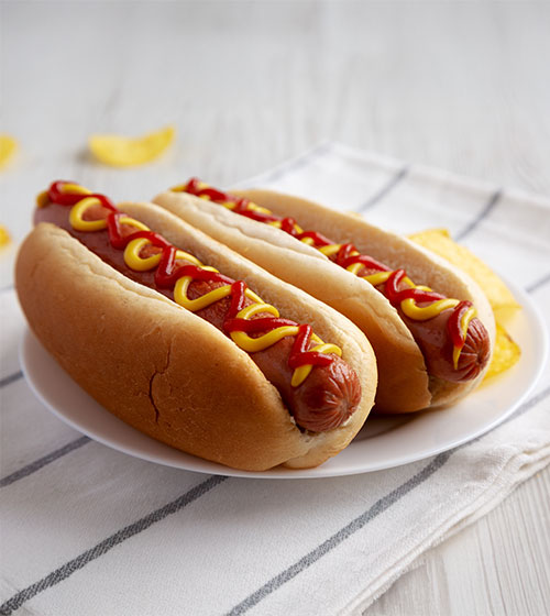 Two hotdogs on a plate
