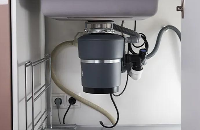 Functional garbage disposal system after installation