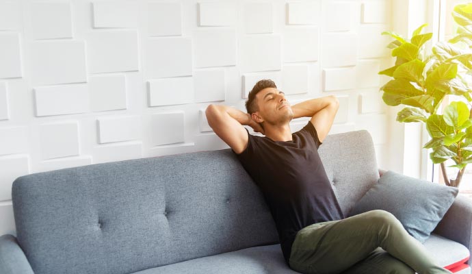 Man relaxing on couch