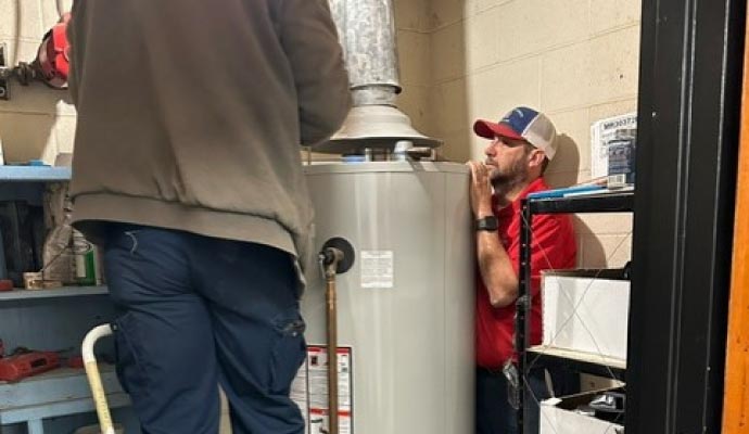 Plumber repair gas water heater Repairing gas water heater