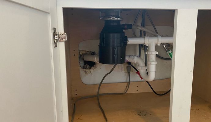 Garbage disposal unit installed in kitchen