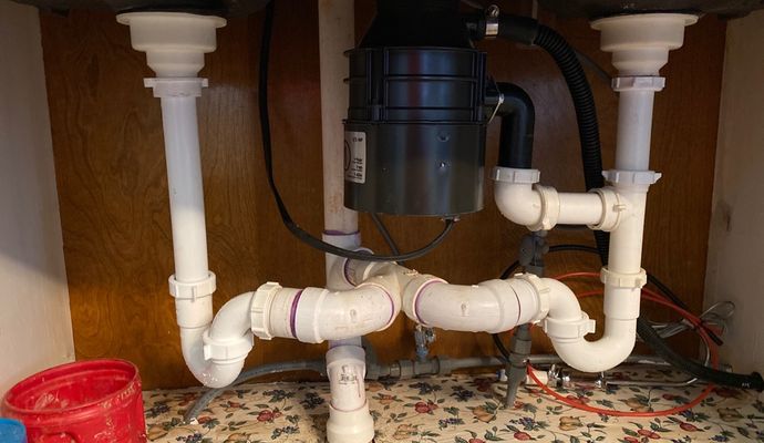 Kitchen garbage disposal installed under the sink