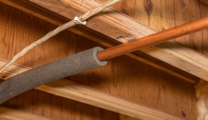 Insulated copper pipe in basement ceiling