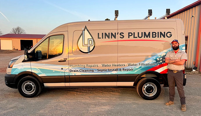  Linn's Plumbing service van and technician