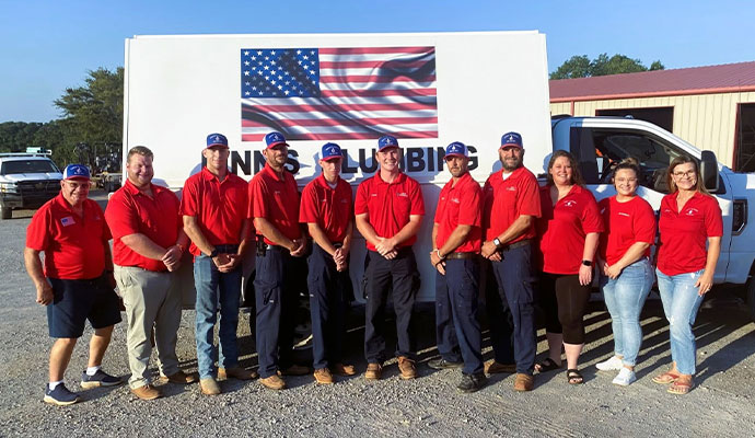 Linns plumbing team and service truck