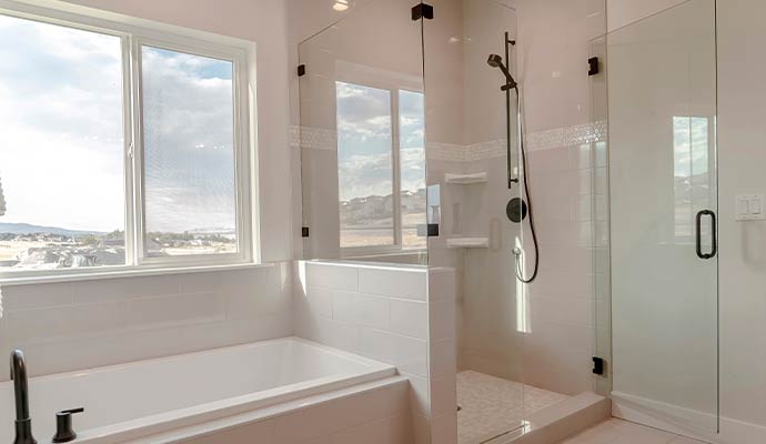Modern bathroom with glass shower and tub