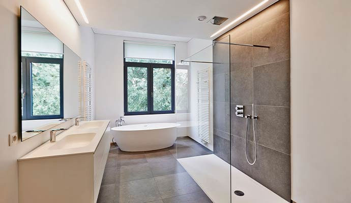 Modern bathroom with walk in shower and bathtub