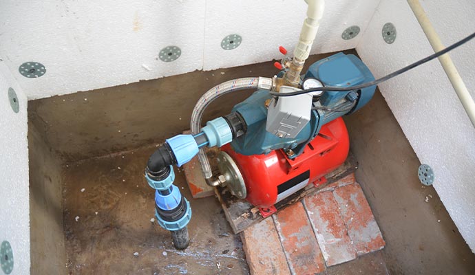A water pump connected to a pressure tank 