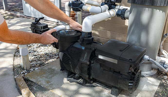Technician installing a new pump 