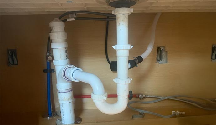 Sink drainage and water supply pipes Sink drainage and water supply pipes