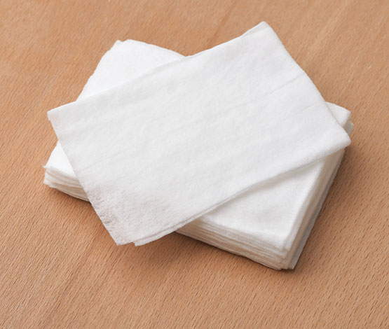 Stack of folded white wipes