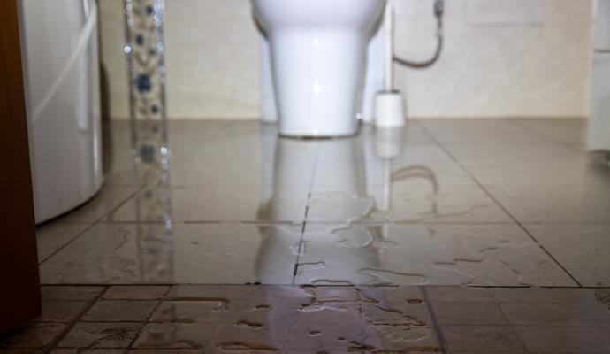 Water damaged bathroom floor